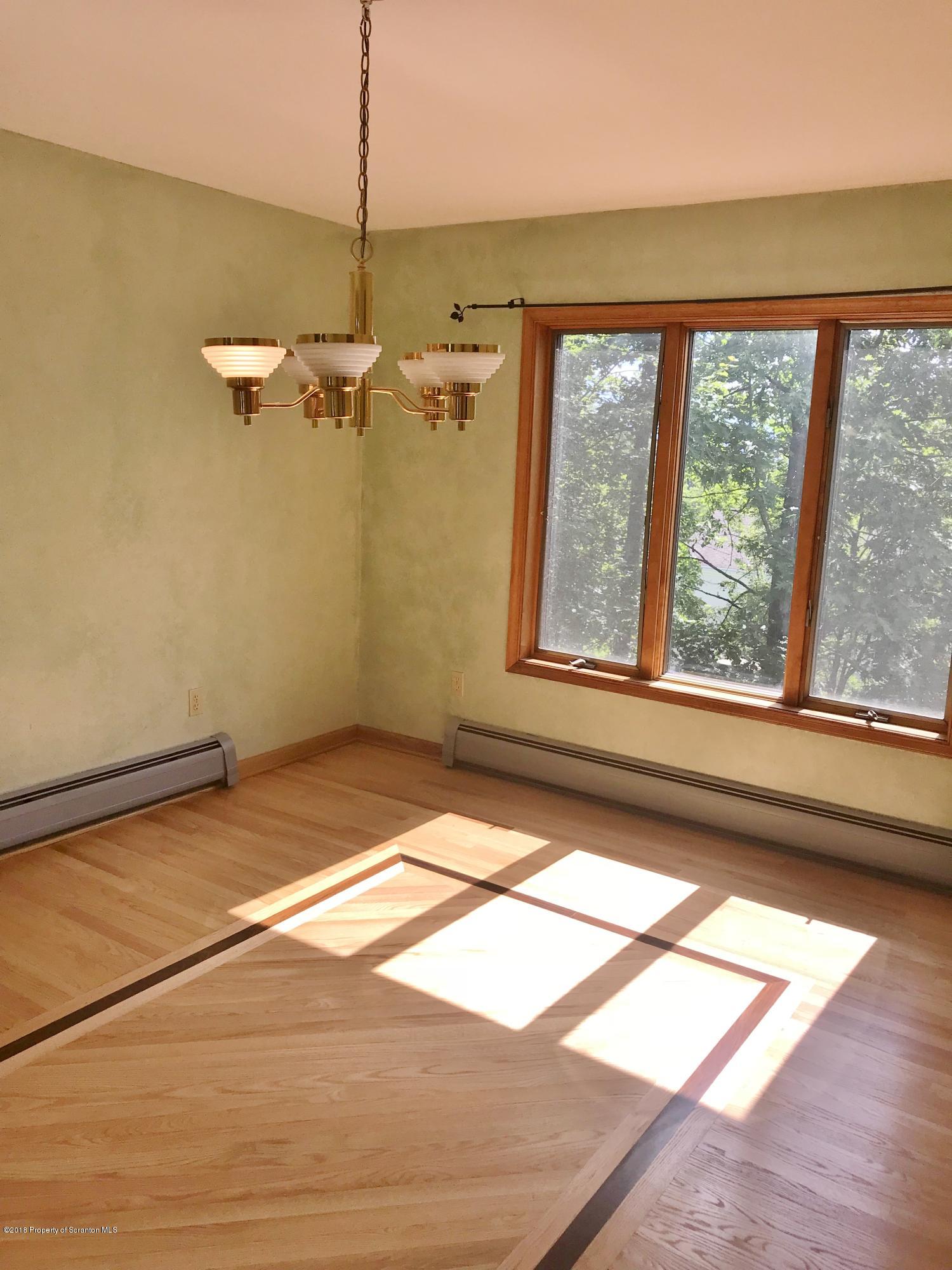 20 Ridgeview Drive Scranton, PA 18504 - Photo 7 of 39 a view of a room with a floor to ceiling window
