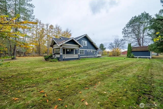 a view of a house with a big yard