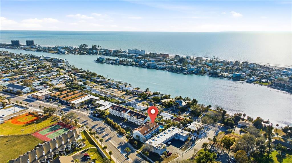 9170 Blind Pass Road St. Pete Beach, FL 33706 - Photo 4 of 58 an aerial view of a city