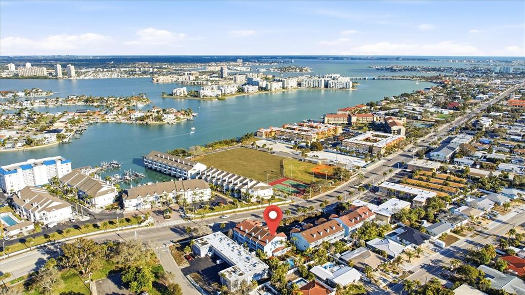 9170 Blind Pass Road St. Pete Beach, FL 33706 - Photo 48 of 58 an aerial view of river residential house with outdoor space