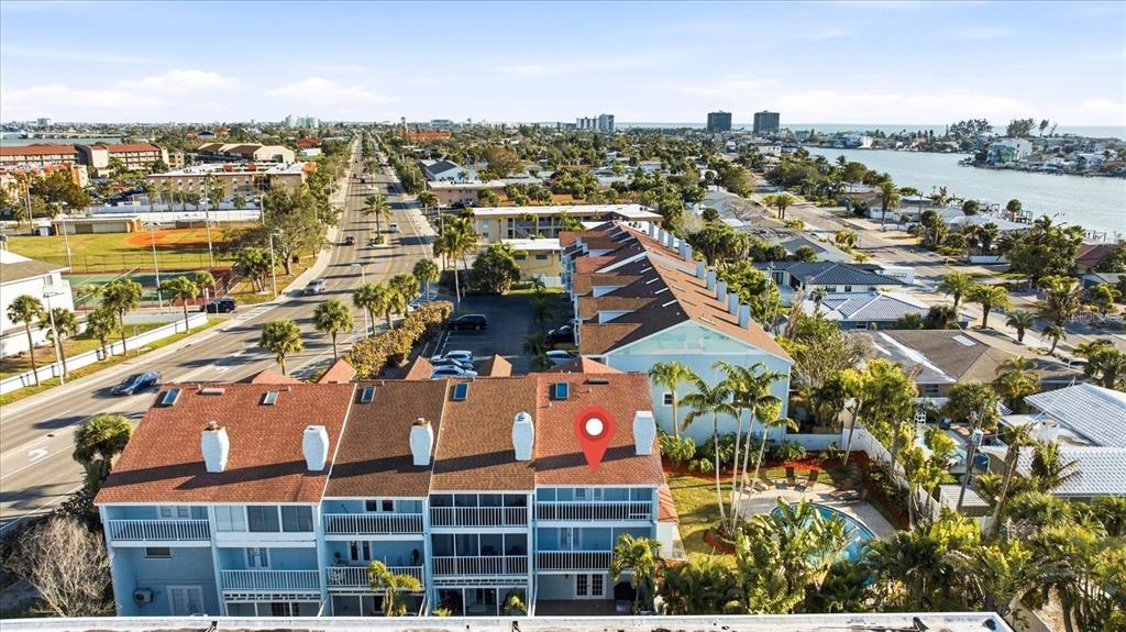 9170 Blind Pass Road St. Pete Beach, FL 33706 - Photo 53 of 58 an aerial view of multiple house