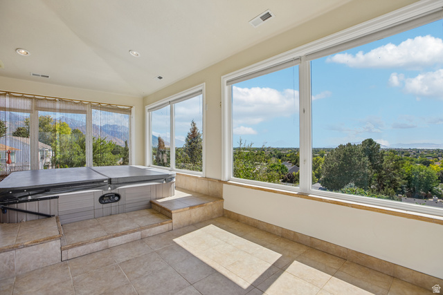 220 East Ridge Road Orem, UT 84057 - Photo 41 of 52 Indoor spa tub with tiled surround, large windows, and recessed lighting