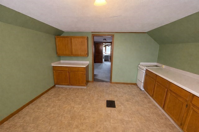 16 Gardner Street, Unit 3 Salem, MA 01970 - Photo 3 of 6 a view of a kitchen with furniture and a ceiling fan