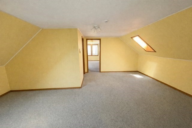 16 Gardner Street, Unit 3 Salem, MA 01970 - Photo 4 of 6 a view of an empty room with a window
