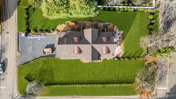 an aerial view of a house having yard