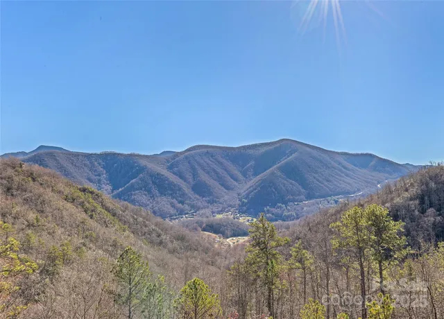 a view of a balcony with furniture