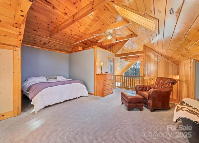 a bathroom with a sink a toilet and shower curtain