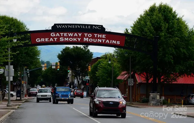 a sign on the side of a road