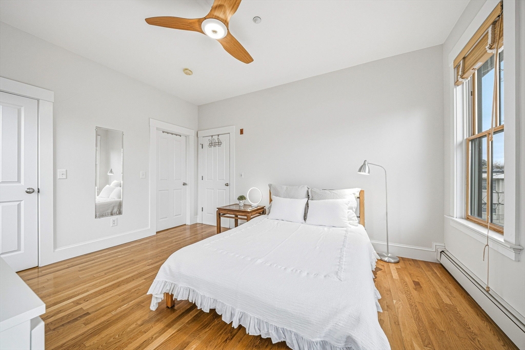 190 Prospect Street, Unit 8 Cambridge, MA 02139 - Photo 19 of 32 a bedroom with bed and window