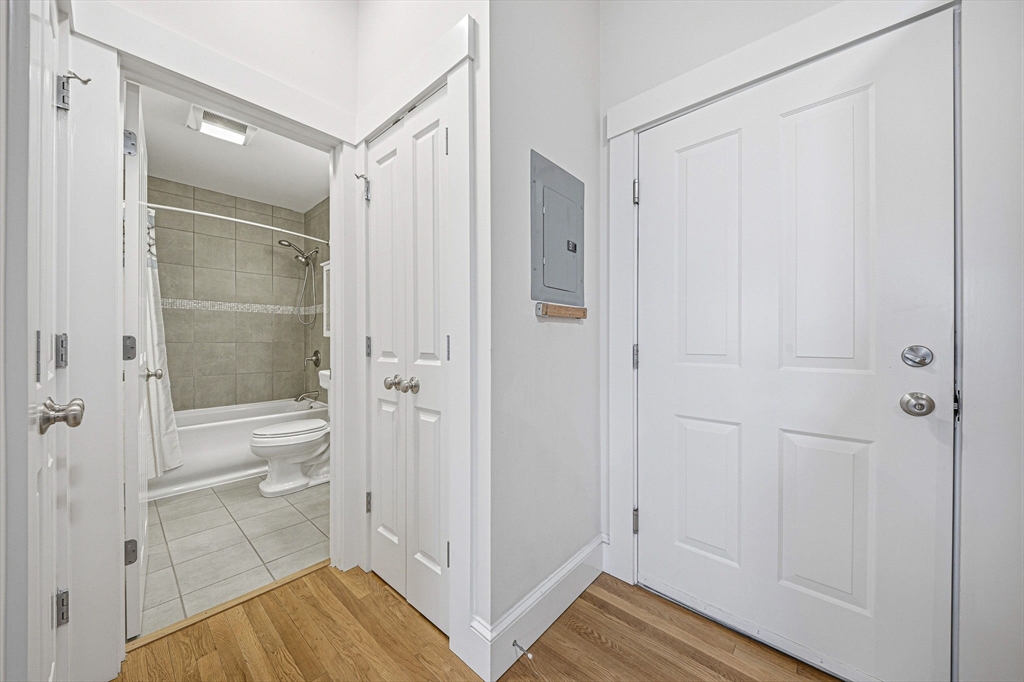 190 Prospect Street, Unit 8 Cambridge, MA 02139 - Photo 22 of 32 a bathroom with a shower and a room