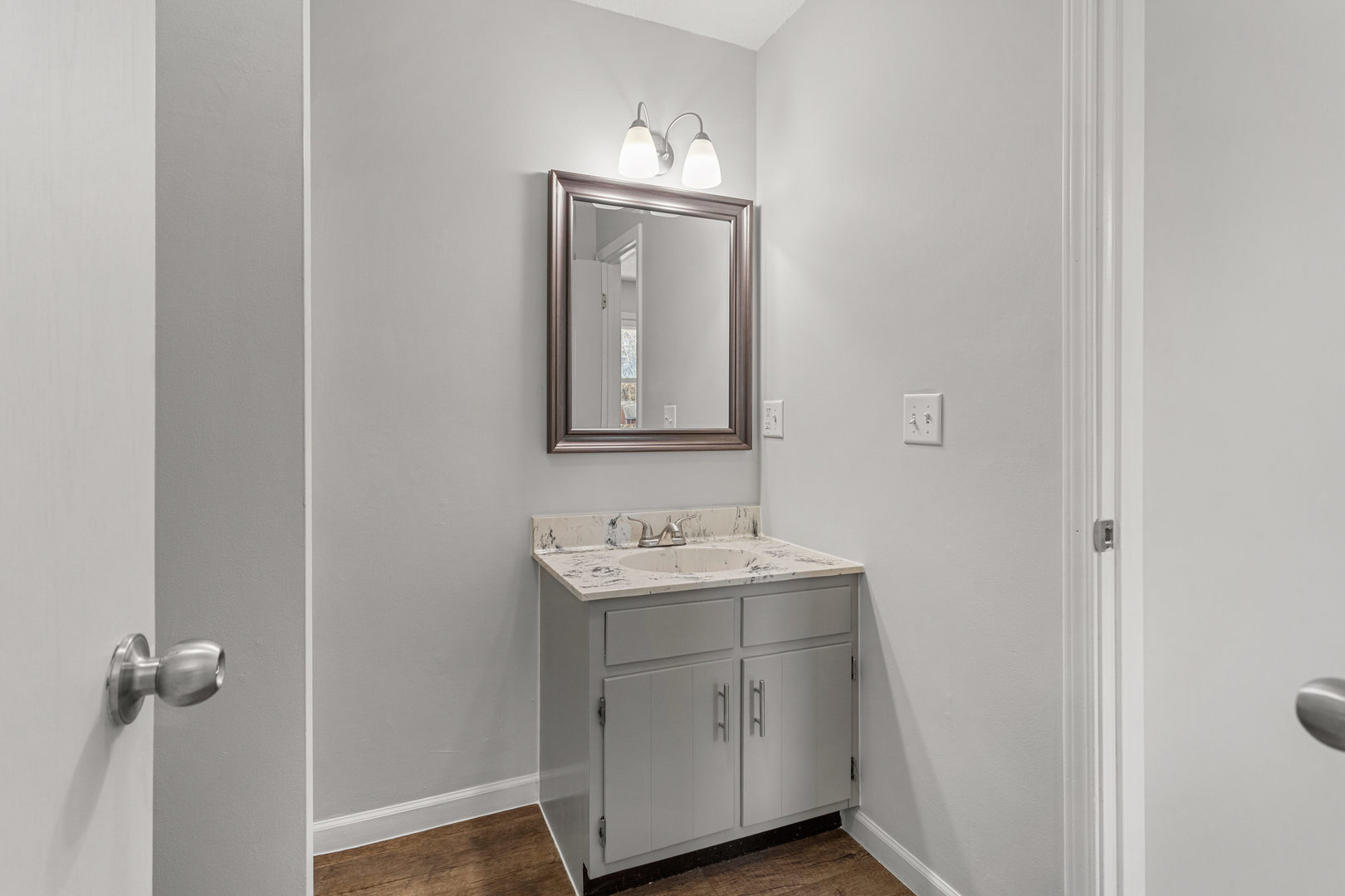 1201 Robin Road Mahomet, IL 61853 - Photo 19 of 33 a bathroom with a sink and a mirror