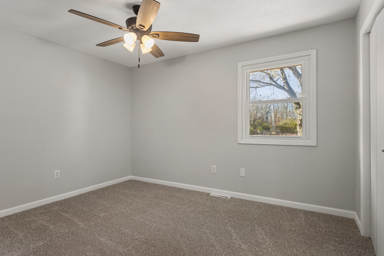 1201 Robin Road Mahomet, IL 61853 - Photo 21 of 33 an empty room with a window