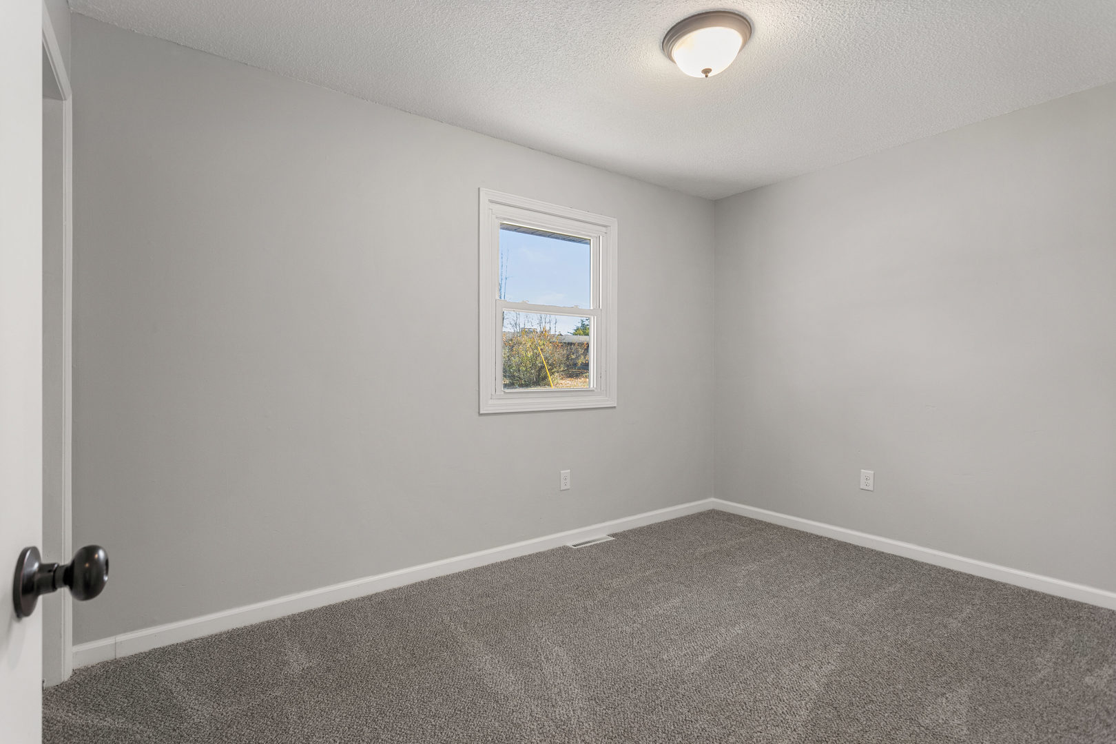 1201 Robin Road Mahomet, IL 61853 - Photo 26 of 33 an empty room with a window
