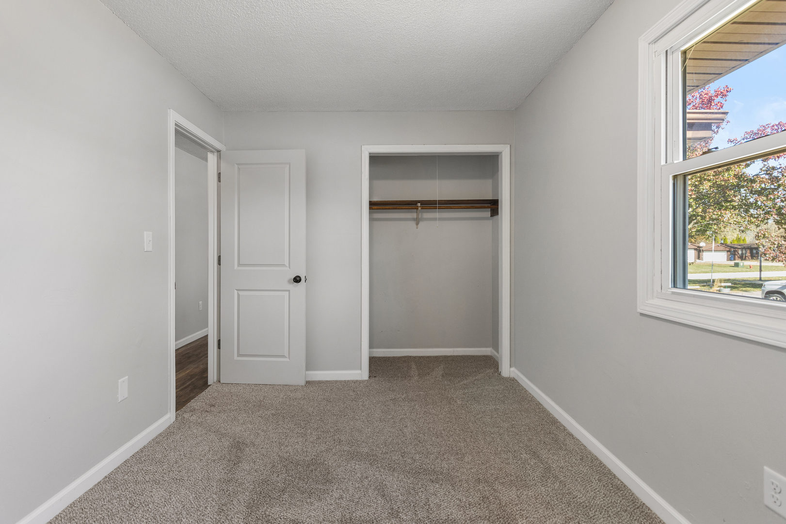 1201 Robin Road Mahomet, IL 61853 - Photo 27 of 33 a view of an empty room with closet and a window
