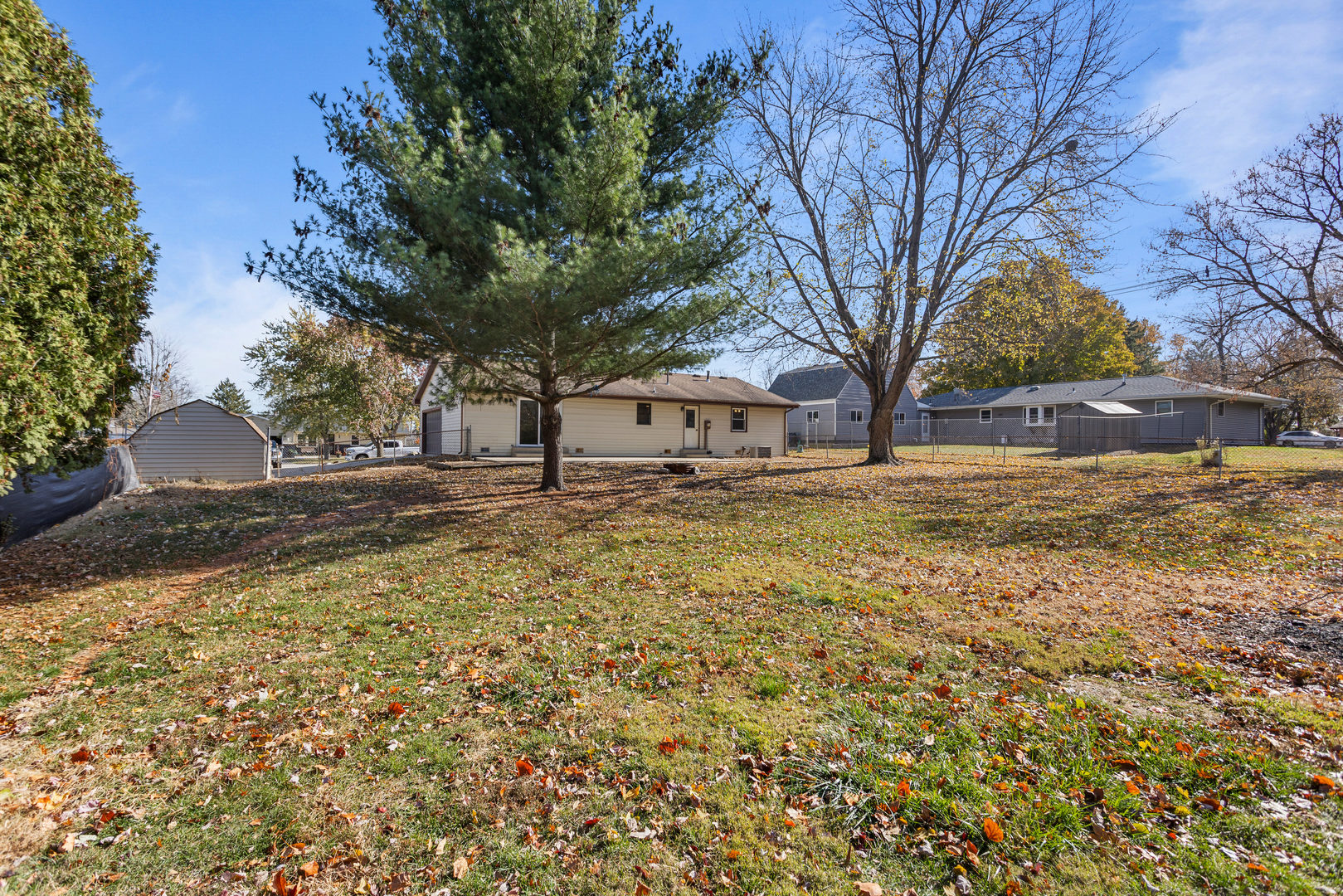 1201 Robin Road Mahomet, IL 61853 - Photo 31 of 33 a house with trees in front of it