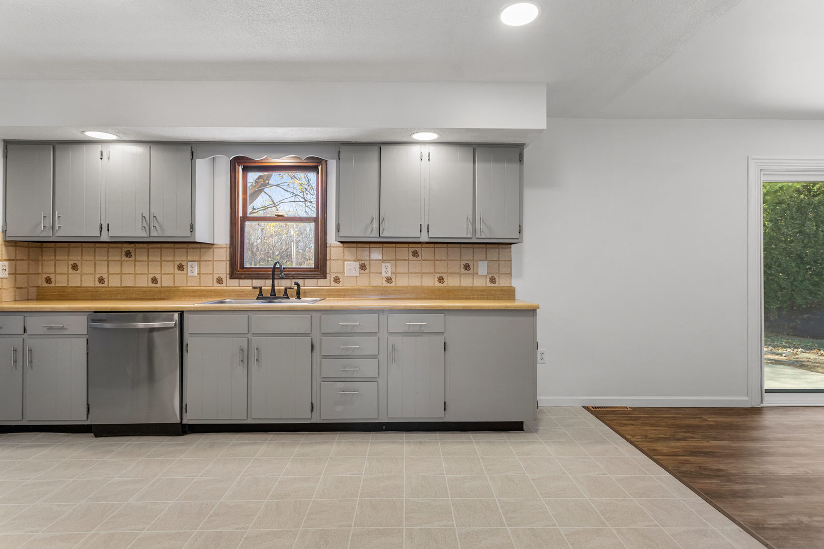 1201 Robin Road Mahomet, IL 61853 - Photo 9 of 33 a view of kitchen with granite countertop cabinets and sink