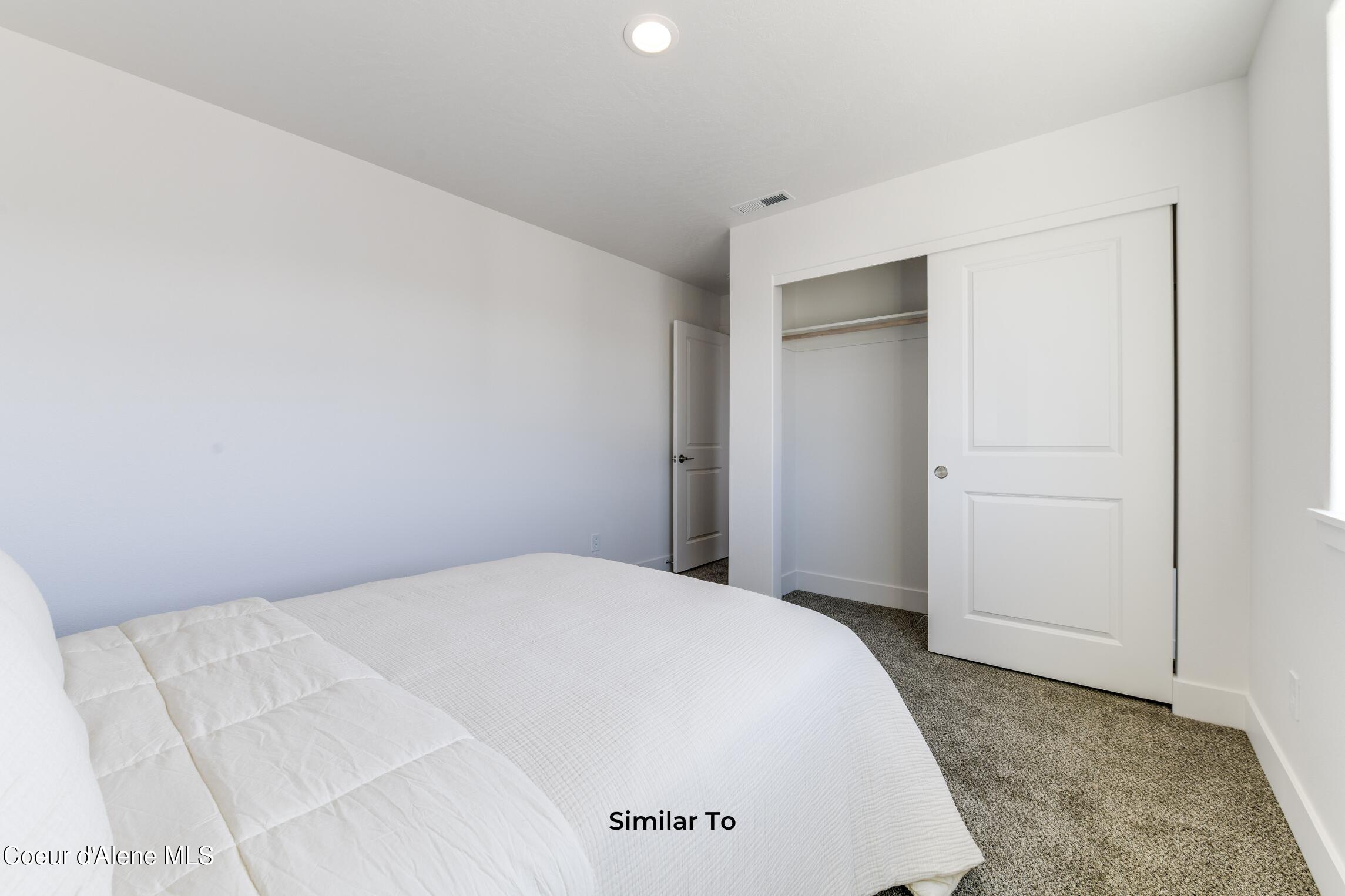 751 North Galbraith Loop Post Falls, ID 83854 - Photo 13 of 22 Secondary Bedroom