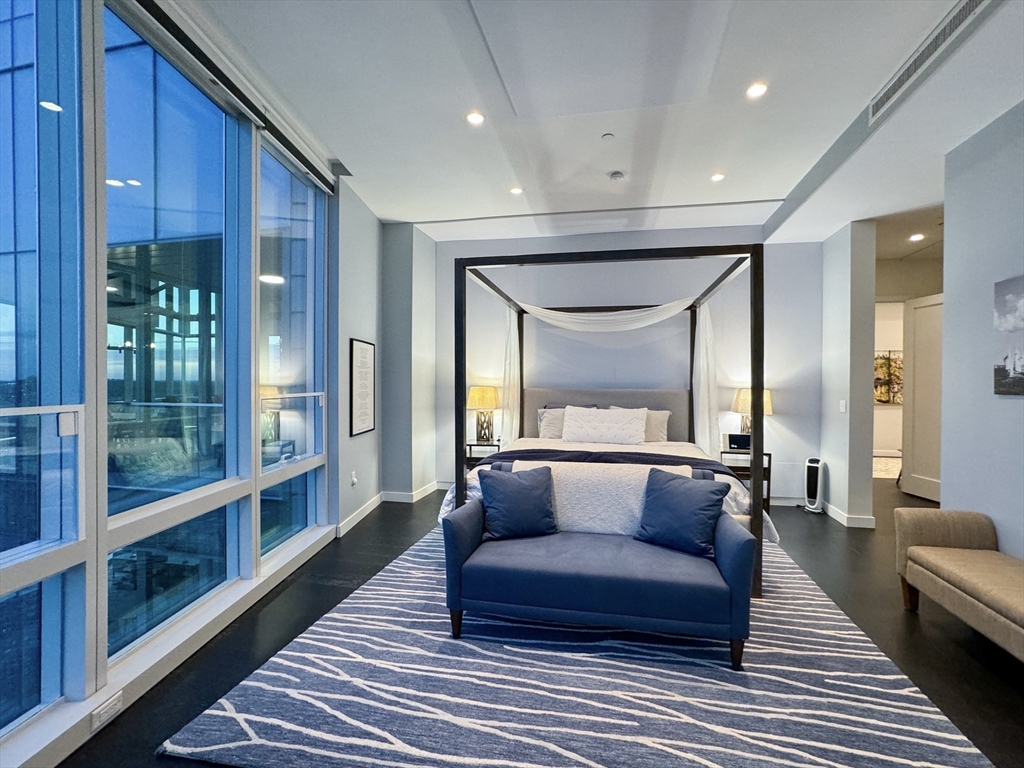 188 Brookline Avenue, Unit PH29A Boston, MA 02215 - Photo 15 of 42 a living room with furniture and a large window