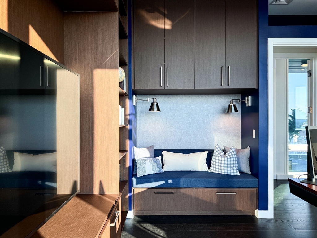 188 Brookline Avenue, Unit PH29A Boston, MA 02215 - Photo 18 of 42 a bedroom with a bed and wooden floor