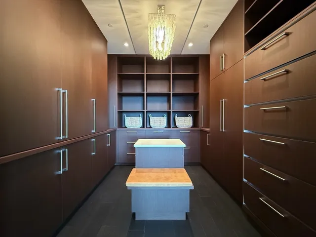 a view of store room with cabinet and window