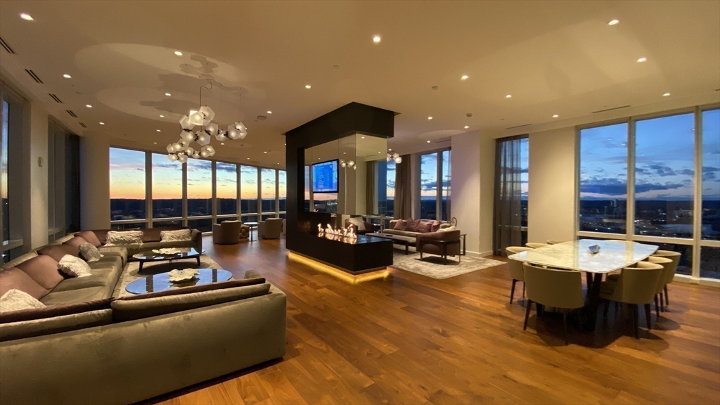 188 Brookline Avenue, Unit PH29A Boston, MA 02215 - Photo 24 of 42 a living room with furniture and a large window
