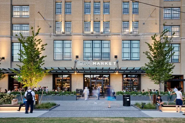 a view of a swimming pool with a balcony