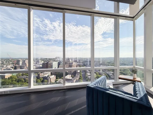 a kitchen with a sink and a large window