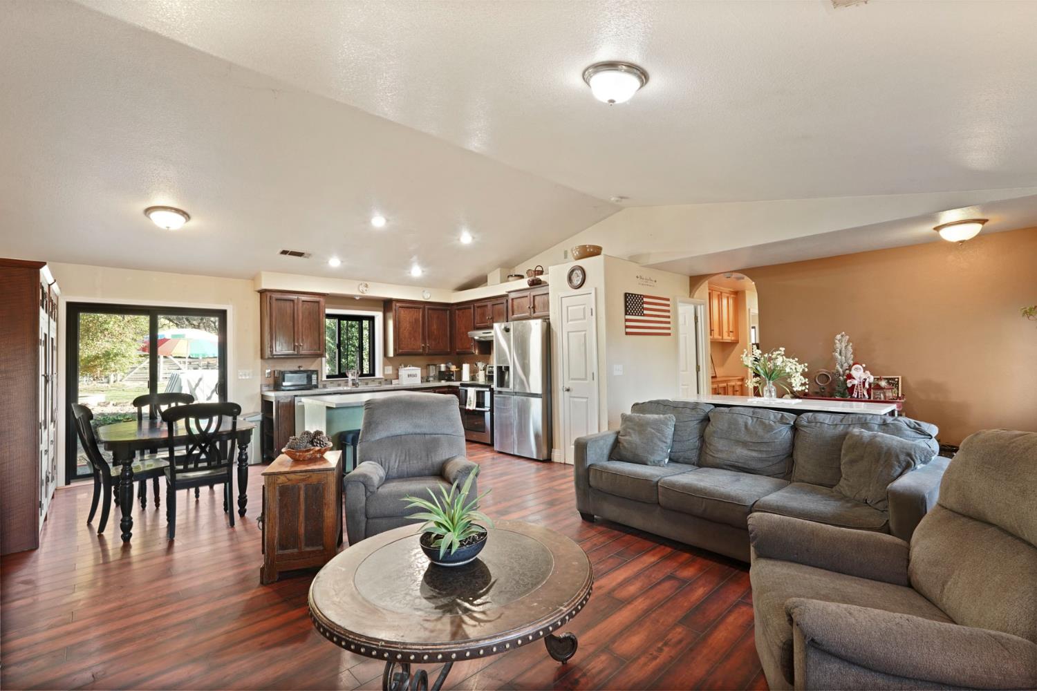 7505 Baldwin Street Valley Springs, CA 95252 - Photo 18 of 45 a living room with furniture and wooden floor