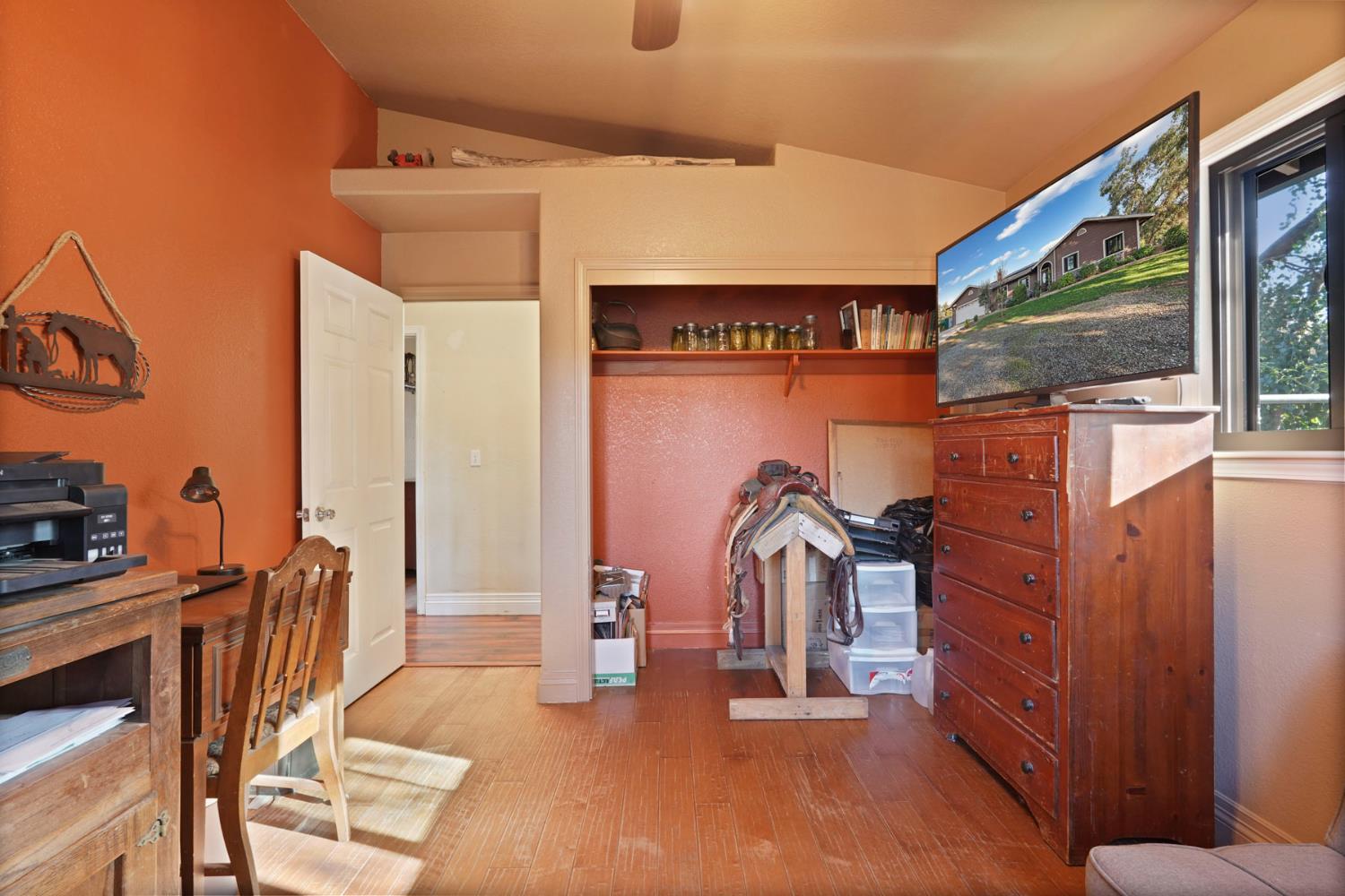 7505 Baldwin Street Valley Springs, CA 95252 - Photo 24 of 45 a view of a patio with table and chairs a barbeque