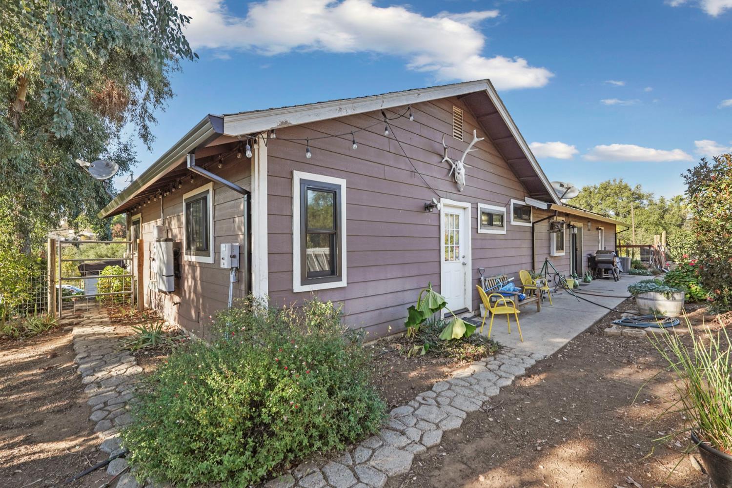 7505 Baldwin Street Valley Springs, CA 95252 - Photo 39 of 45 a front view of a house with garden