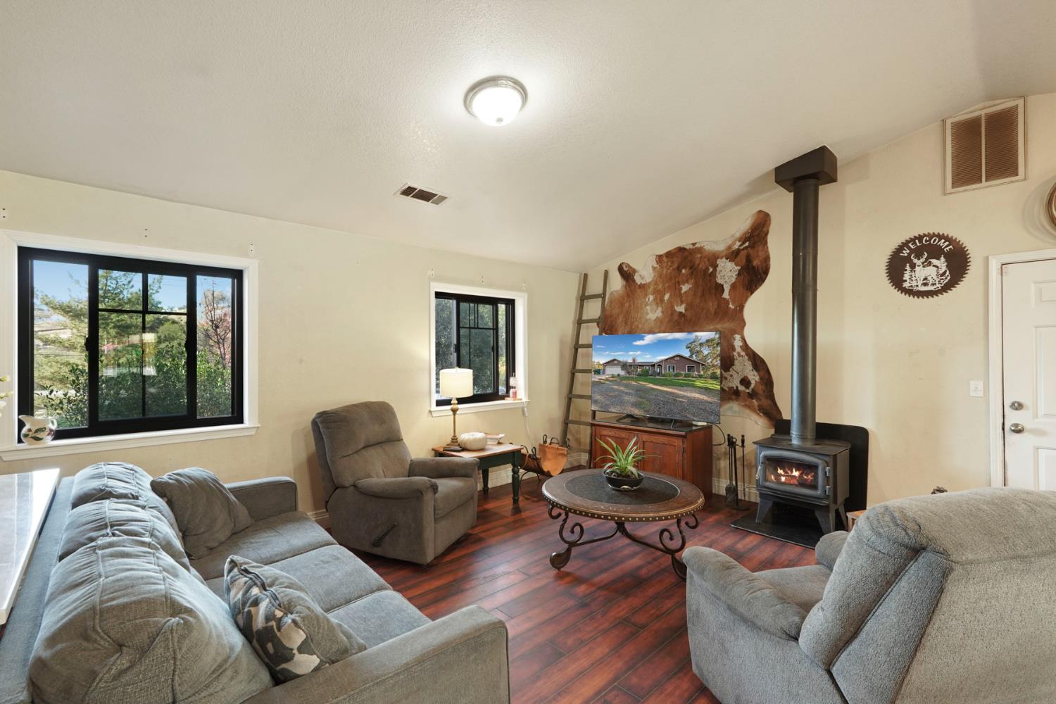 7505 Baldwin Street Valley Springs, CA 95252 - Photo 10 of 45 a living room with furniture and a window