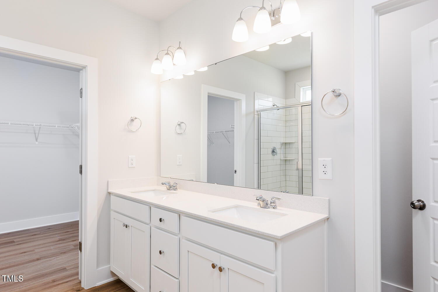 207 Golfview Avenue Four Oaks, NC 27524 - Photo 13 of 37 a bathroom with a sink vanity and a mirror
