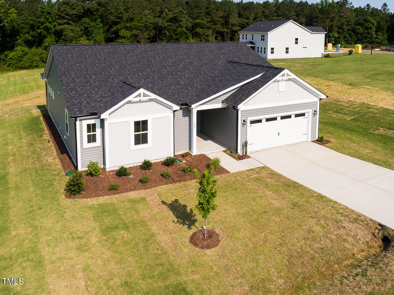 207 Golfview Avenue Four Oaks, NC 27524 - Photo 17 of 37 a view of a house with a yard