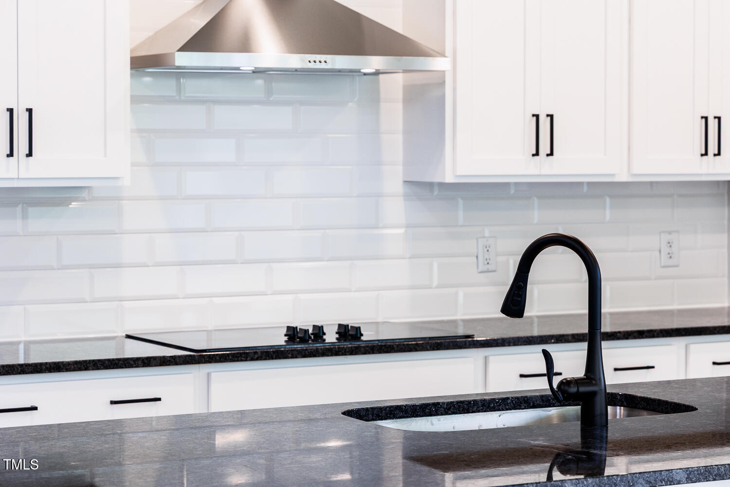 207 Golfview Avenue Four Oaks, NC 27524 - Photo 19 of 37 a close view of sink and tap
