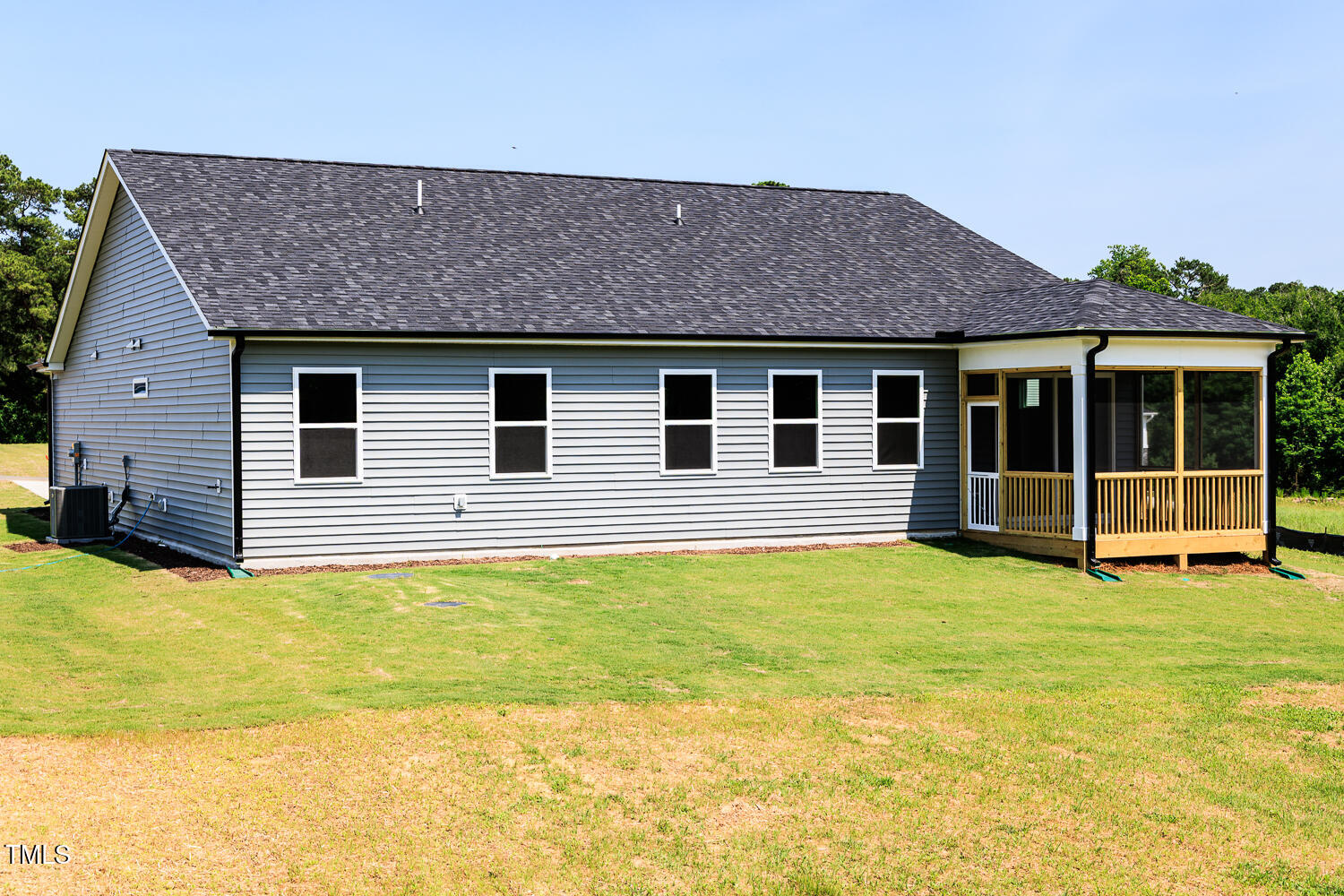 207 Golfview Avenue Four Oaks, NC 27524 - Photo 24 of 37 a view of a house with a backyard