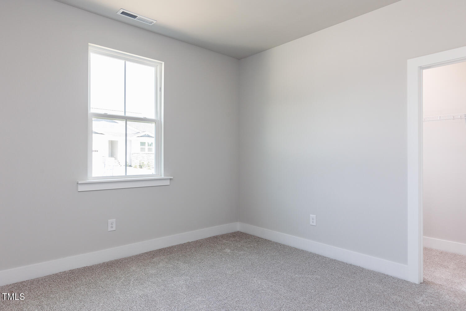 207 Golfview Avenue Four Oaks, NC 27524 - Photo 29 of 37 an empty room with a window