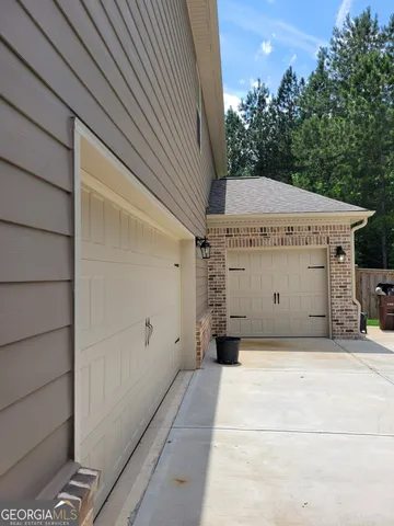 a view of a room with a garage