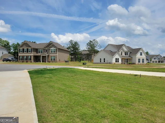 a house view with garden space