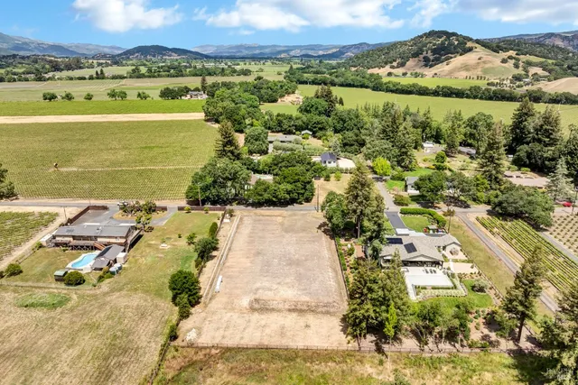 a view of a city with a lake