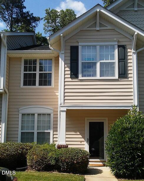 2006 Lost Lane Raleigh, NC 27603 - Photo 1 of 9 a front view of a house with a yard
