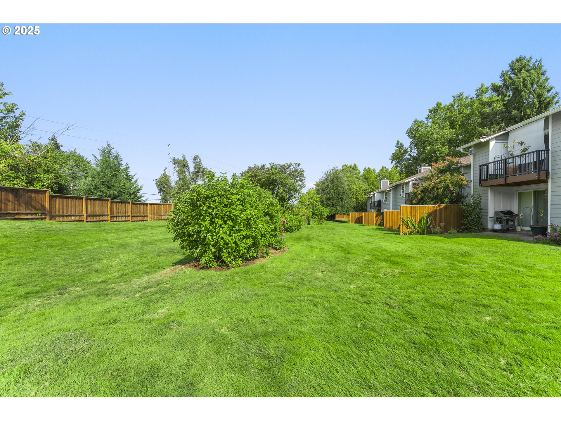 8512 Southwest Mohawk Street Tualatin, OR 97062 - Photo 24 of 33 a view of a house with a big yard