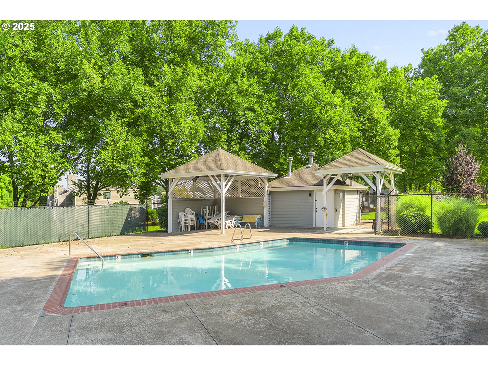 8512 Southwest Mohawk Street Tualatin, OR 97062 - Photo 29 of 33 a view of a house with a yard patio and sitting area