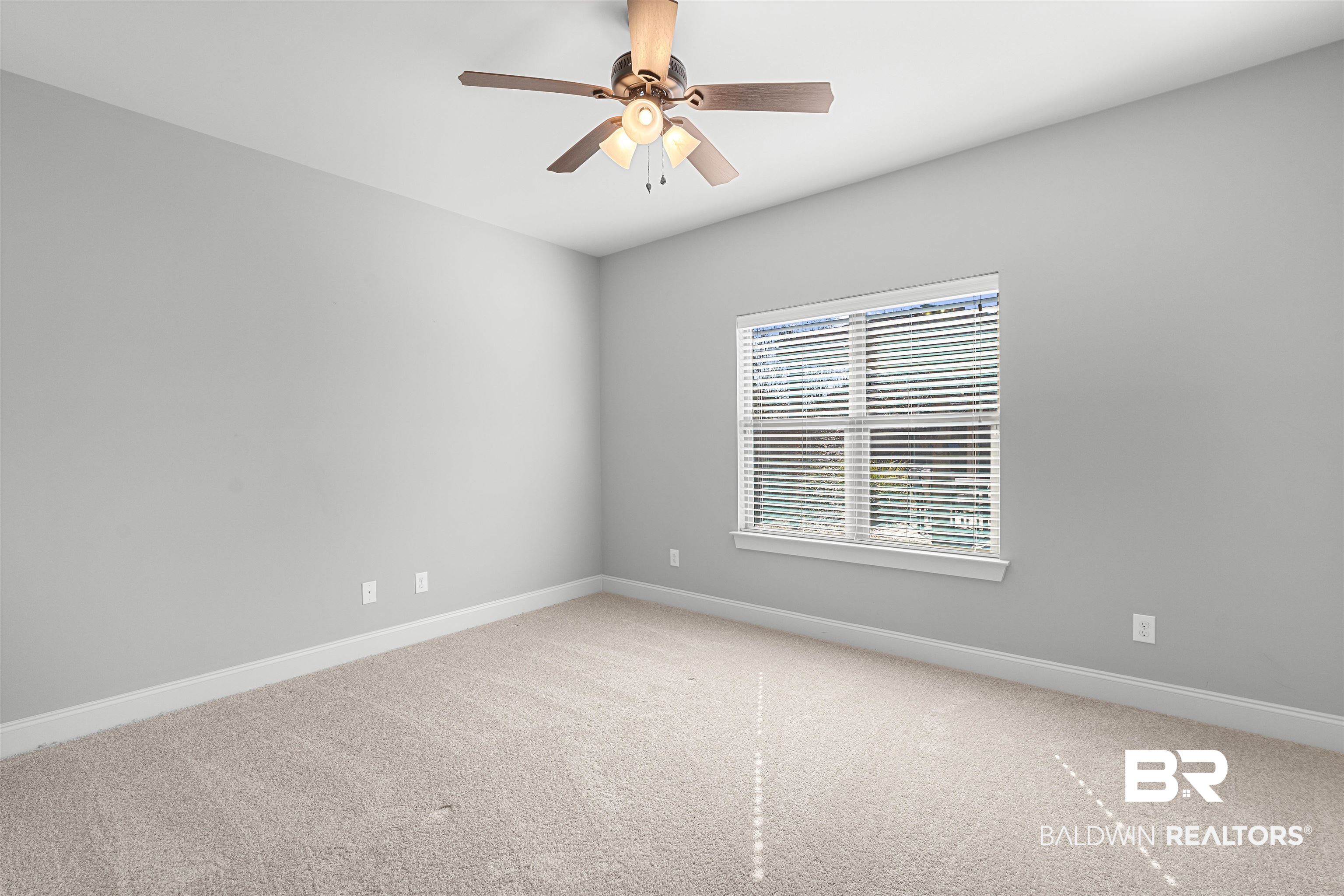 8844 Rosedown Lane Daphne, AL 36526 - Photo 18 of 24 Unfurnished room featuring light carpet and ceiling fan