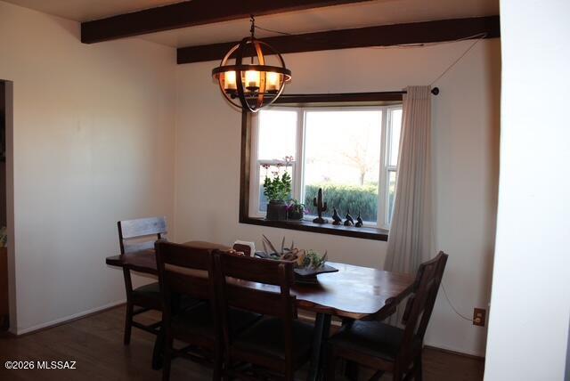 1201 East Old Stewart Road Willcox, AZ 85643 - Photo 24 of 49 a view of a dining room with furniture wooden floor and chandelier