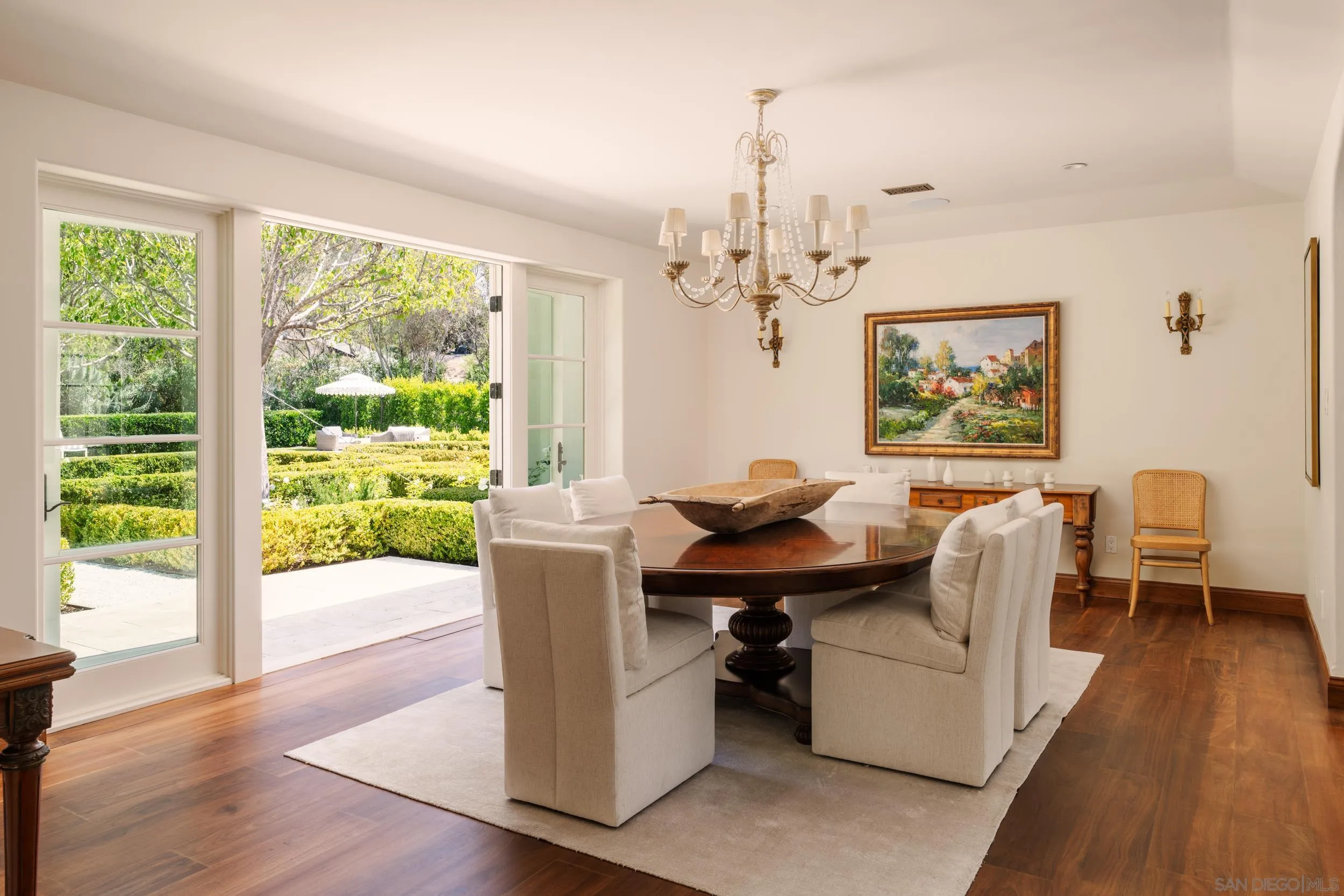 5406 Calzada Del Bosque Rancho Santa Fe, CA 92067 - Photo 9 of 30 a view of a dining room with furniture window and wooden floor