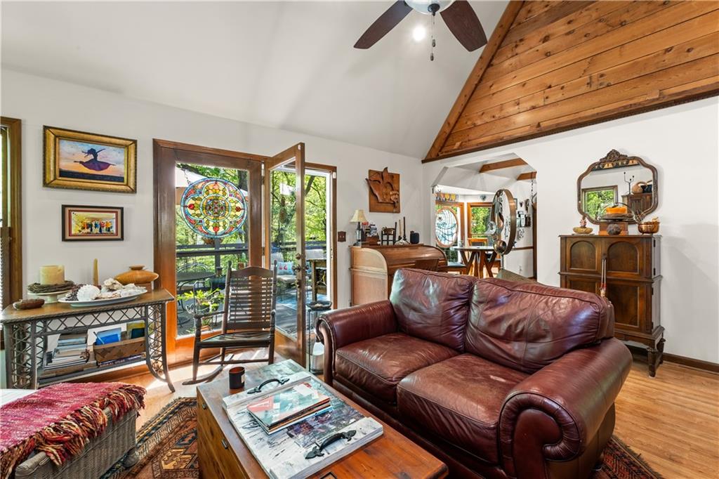 511 Oakdale Road Canton, GA 30114 - Photo 12 of 50 a living room with furniture and a floor to ceiling window