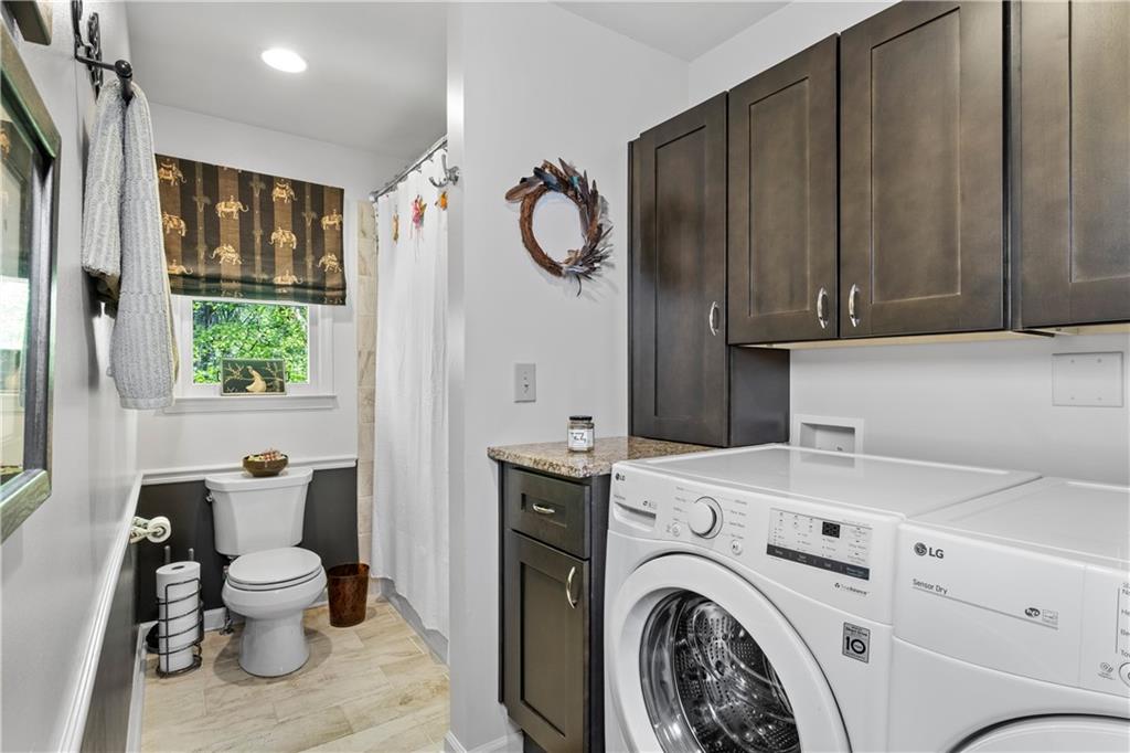 511 Oakdale Road Canton, GA 30114 - Photo 15 of 50 a view of bathroom with washer and dryer