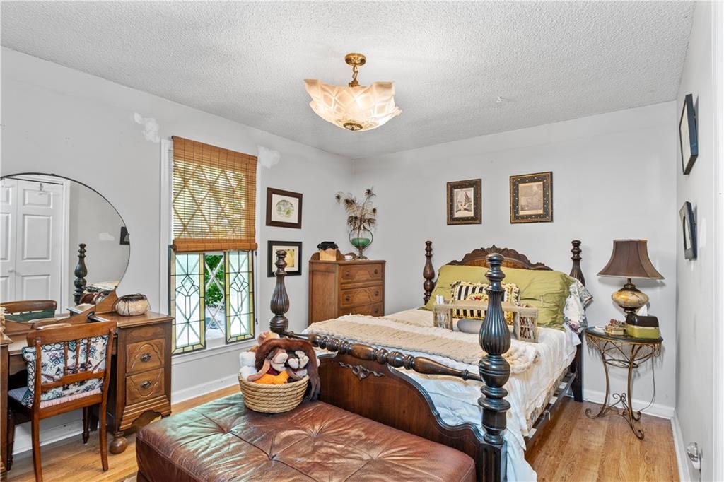 511 Oakdale Road Canton, GA 30114 - Photo 16 of 50 a living room with furniture a chandelier