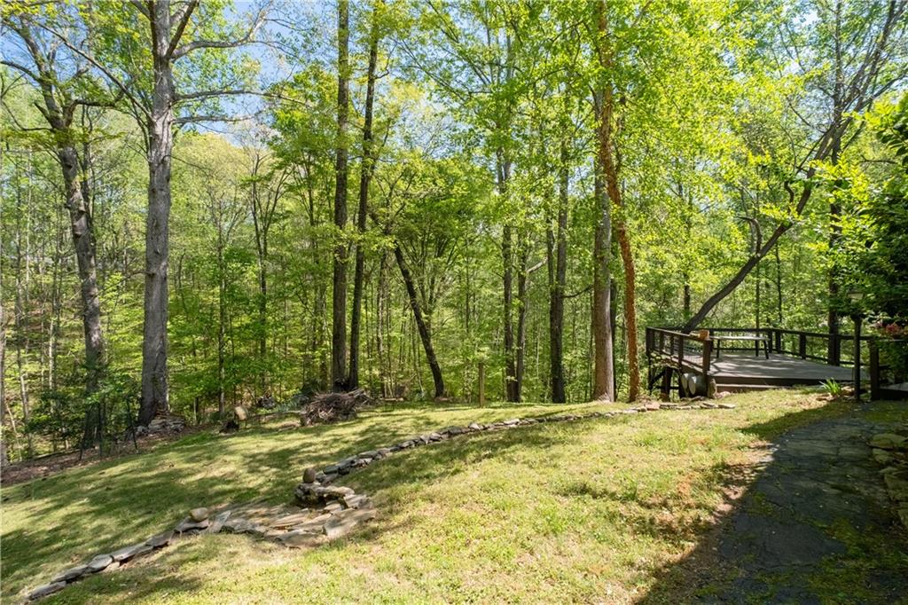 511 Oakdale Road Canton, GA 30114 - Photo 33 of 50 a view of swimming pool with a yard