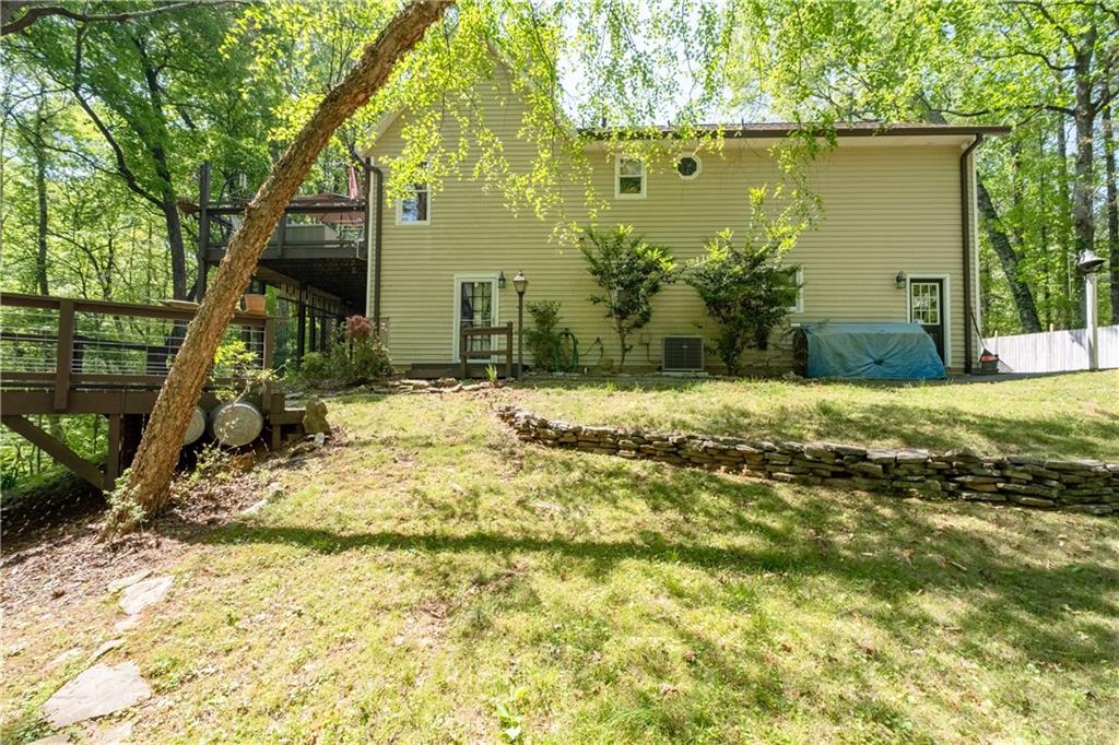 511 Oakdale Road Canton, GA 30114 - Photo 36 of 50 a view of a house with a yard